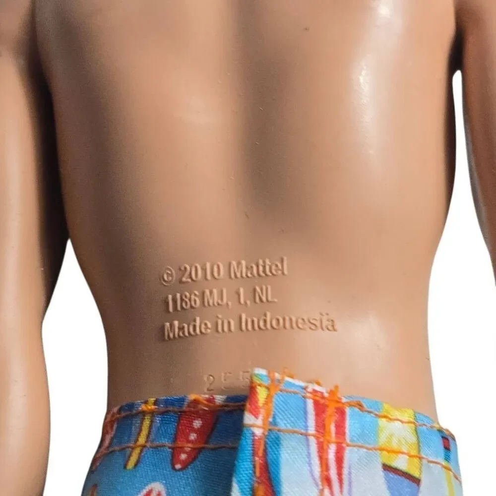 Ken Barbie Mattel Doll 2012 molded hair swimsuits Brunette EUC C383G